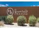 Heartland Ranch community entrance sign with landscaping at 1720 W Coolidge Way, Coolidge, AZ 85128