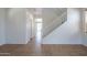 Clean hallway with tile floors and access to other rooms at 25796 W Hazel Dr, Buckeye, AZ 85326