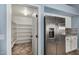 Walk-in pantry with ample shelving for storage at 17218 N Melissa Ln, Surprise, AZ 85374