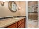 Bathroom with granite vanity and shower/tub combo at 35140 N 52Nd Pl, Cave Creek, AZ 85331