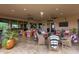 Spacious covered patio perfect for entertaining, with comfortable seating and ceiling fans at 35140 N 52Nd Pl, Cave Creek, AZ 85331
