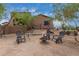 Relaxing backyard patio with fire pit and seating area at 35140 N 52Nd Pl, Cave Creek, AZ 85331