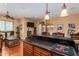 Bar area with seating and a granite countertop at 35140 N 52Nd Pl, Cave Creek, AZ 85331