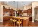Spacious kitchen with granite island, custom cabinetry, and breakfast bar at 35140 N 52Nd Pl, Cave Creek, AZ 85331