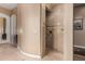 Large walk-in shower with multiple shower heads and tiled walls at 35140 N 52Nd Pl, Cave Creek, AZ 85331