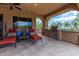 Relaxing outdoor patio with built-in grill, seating area, and beautiful views at 35140 N 52Nd Pl, Cave Creek, AZ 85331