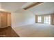 Large living room with hardwood floors and access to patio at 292 Leisure World --, Mesa, AZ 85206