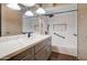 Updated bathroom with white subway tile and gray vanity at 292 Leisure World --, Mesa, AZ 85206