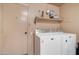 Laundry room with washer, dryer, and shelving at 292 Leisure World --, Mesa, AZ 85206