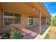 Back patio with access to the backyard at 292 Leisure World --, Mesa, AZ 85206