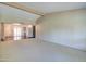 Bright living room with vaulted ceilings and view into dining area at 292 Leisure World --, Mesa, AZ 85206
