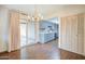 Dining room features hardwood floors and view into kitchen at 292 Leisure World --, Mesa, AZ 85206