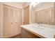 Modern bathroom with gray vanity and quartz countertop at 292 Leisure World --, Mesa, AZ 85206