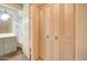 Bathroom with updated vanity and linen storage at 292 Leisure World --, Mesa, AZ 85206