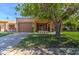 House exterior with carport and landscaped lawn at 292 Leisure World --, Mesa, AZ 85206