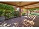 Covered patio with brick columns and view of street at 292 Leisure World --, Mesa, AZ 85206