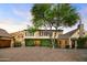 Luxury home with brick driveway and lush landscaping at 27050 N 103Rd St, Scottsdale, AZ 85262