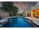 Stunning pool and spa with a waterfall feature, perfect for entertaining at 5116 W Trotter Trl, Phoenix, AZ 85083