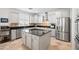 Well-appointed kitchen featuring granite island and stainless steel appliances at 5116 W Trotter Trl, Phoenix, AZ 85083