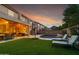 Landscaped backyard with a pool and patio furniture at 5116 W Trotter Trl, Phoenix, AZ 85083