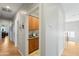 Convenient laundry room with upper cabinets and a utility sink at 5116 W Trotter Trl, Phoenix, AZ 85083
