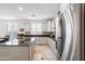 Spacious kitchen with granite island, stainless steel appliances, and ample cabinetry at 5116 W Trotter Trl, Phoenix, AZ 85083