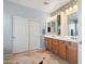 Elegant bathroom with double vanity, large shower and soaking tub at 5116 W Trotter Trl, Phoenix, AZ 85083