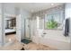 Bathroom with a shower, bathtub, and updated vanity at 5116 W Trotter Trl, Phoenix, AZ 85083