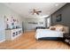 Large bedroom featuring a comfortable sitting area and plenty of natural light at 5116 W Trotter Trl, Phoenix, AZ 85083