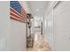 Hallway with access to kitchen and laundry room at 5116 W Trotter Trl, Phoenix, AZ 85083