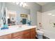 Clean bathroom with a bathtub and updated vanity at 5116 W Trotter Trl, Phoenix, AZ 85083
