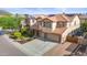 Two story house with three car garage and solar panels at 5116 W Trotter Trl, Phoenix, AZ 85083