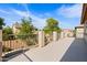 Private patio with metal railing and views of neighborhood at 5116 W Trotter Trl, Phoenix, AZ 85083