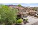 Two-story house with solar panels and landscaped yard at 5116 W Trotter Trl, Phoenix, AZ 85083