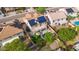 Aerial view highlighting the home's solar panels and backyard amenities at 5116 W Trotter Trl, Phoenix, AZ 85083