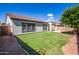 Spacious backyard with grassy lawn at 19741 E Reins Rd, Queen Creek, AZ 85142