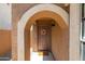 Inviting entryway with arched entry and terracotta tile floor at 17555 W Dalea Dr, Goodyear, AZ 85338