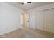 Bedroom with double doors leading to another room at 17555 W Dalea Dr, Goodyear, AZ 85338