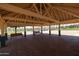 Brick paved gazebo with wooden beams and park views at 17555 W Dalea Dr, Goodyear, AZ 85338