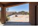 Landscaped backyard with patio and fire pit at 17555 W Dalea Dr, Goodyear, AZ 85338