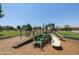 Community playground with playset and slides at 17555 W Dalea Dr, Goodyear, AZ 85338