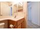 Bathroom with double sinks and tile floor at 17555 W Dalea Dr, Goodyear, AZ 85338