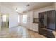 Bright kitchen features stainless steel appliances and white cabinetry at 17555 W Dalea Dr, Goodyear, AZ 85338