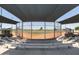 Covered dugout with bleacher seating at 17555 W Dalea Dr, Goodyear, AZ 85338