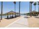 Lakeside park with gazebos, picnic tables and a walking path at 17555 W Dalea Dr, Goodyear, AZ 85338