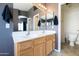 Bathroom with double sinks and a toilet at 17555 W Dalea Dr, Goodyear, AZ 85338