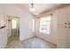 Laundry room with built-in shelving, a window, and modern washer and dryer at 17555 W Dalea Dr, Goodyear, AZ 85338