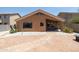 Backyard features a flagstone patio, and a covered patio at 17555 W Dalea Dr, Goodyear, AZ 85338