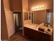 Bathroom with double sinks and a large mirror at 1371 E Judi Dr, Casa Grande, AZ 85122