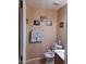 Guest bathroom includes toilet and vanity at 44973 W Sandhill Rd, Maricopa, AZ 85139